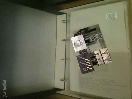 The pattern, an image of the interior of The Little Gallery, presented in its archival box context.